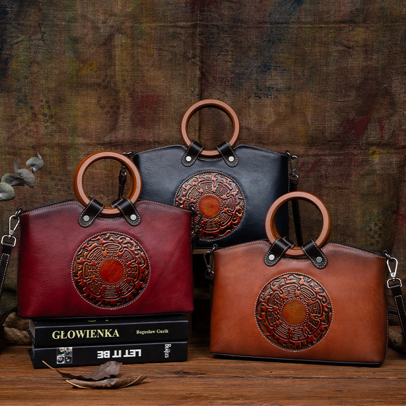 ShopBAM — Embossed Leather Messenger Bag