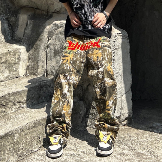 ShopBAM — Camo Alphabet Embroidered Jeans — Women&