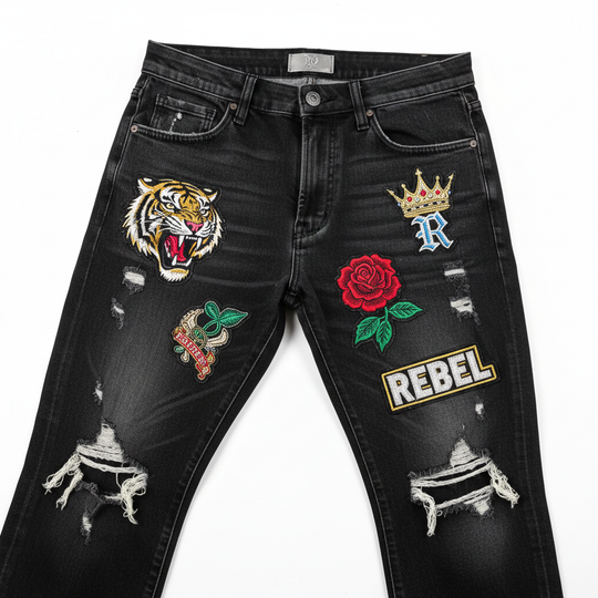 Badge-patch distressed jeans flat lay product photography
